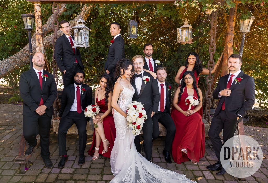 burgundy-bridal-party-photo-on-swing
