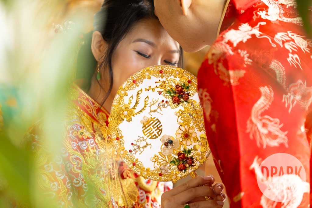Golden hour couple portraits at whimsical sunflower farm wedding in Orange County by D. Park Studios