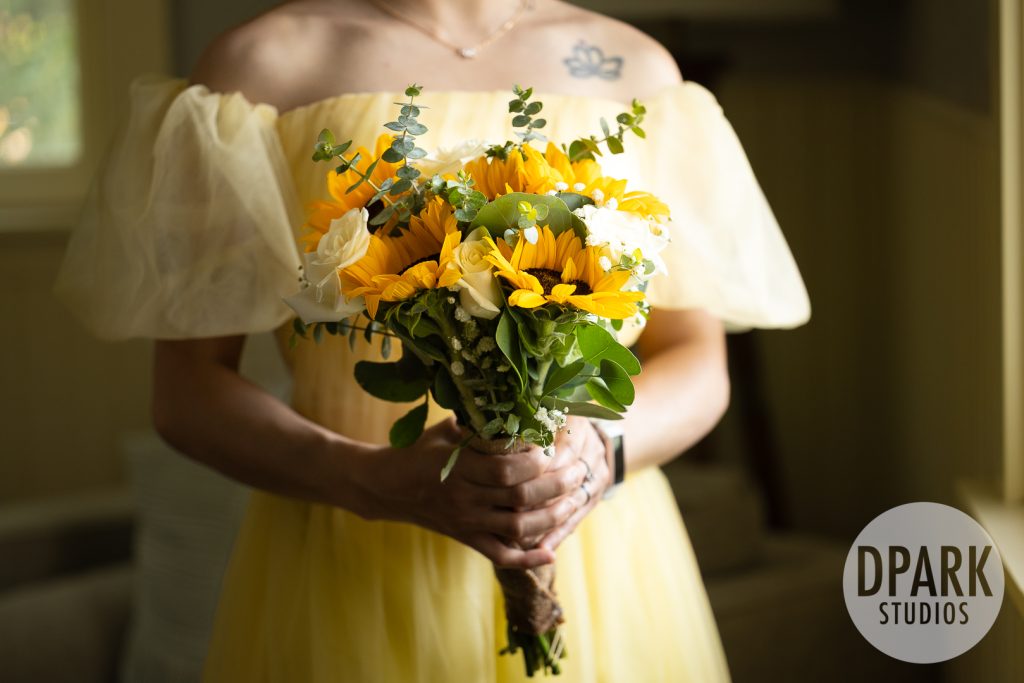 Sunflower bouquet by Daisy’s Flowers for outdoor Chinese wedding at Gold Coast Farms 