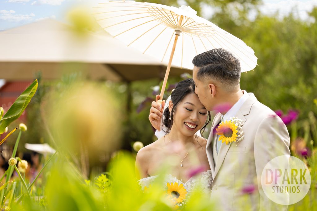 Bride’s elegant curls by e2Beauty for Gold Coast Farms sunflower wedding in Orange County