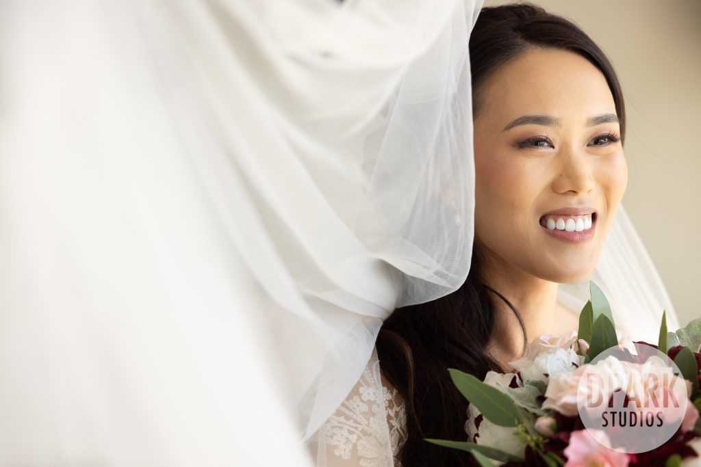 Emotional wedding ceremony officiated by Martin Ho at VEA Newport Beach